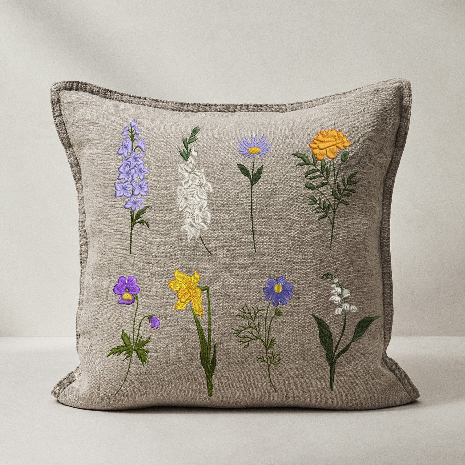 Beautiful wildflower machine embroidery design on pillow