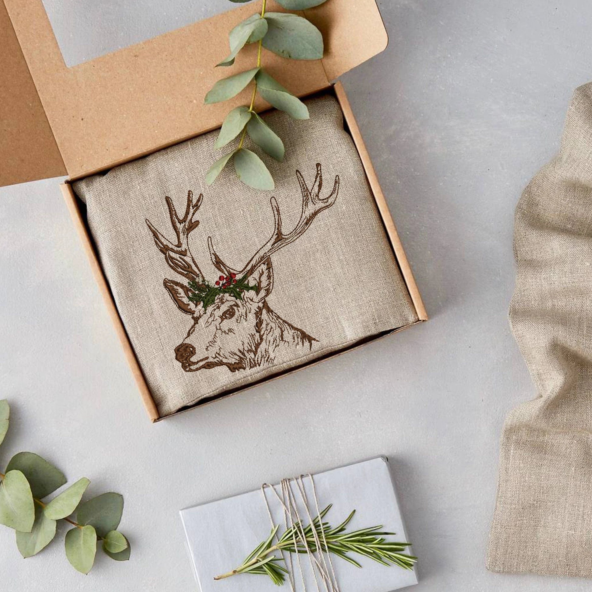 Christmas deer machine embroidery design on free gift  box wrapping