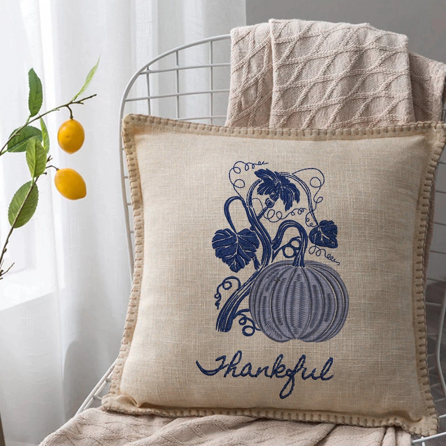 Blue pumpkin machine embroidery design on pillow