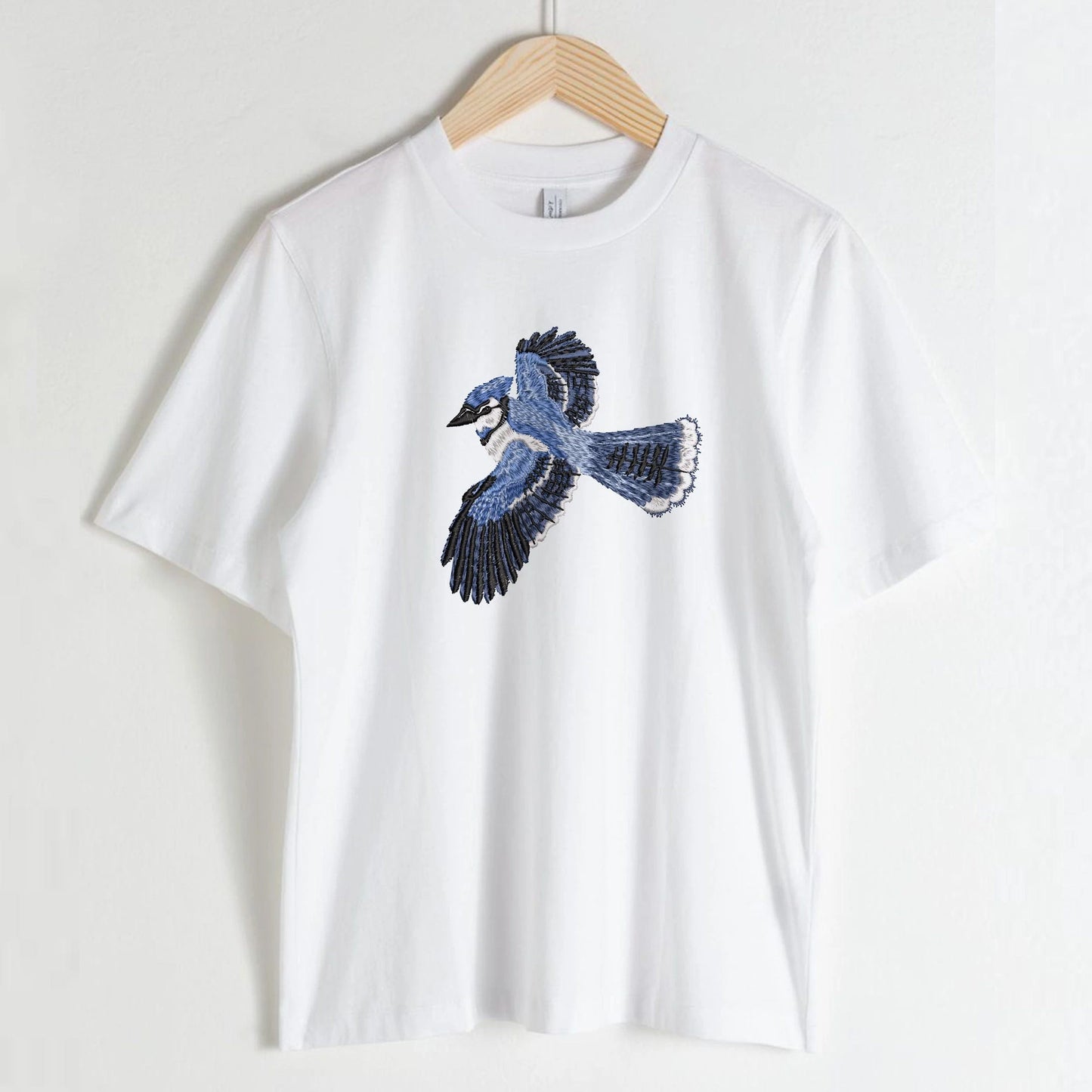 Beautiful Bluebird machine embroidery design on t-shirt