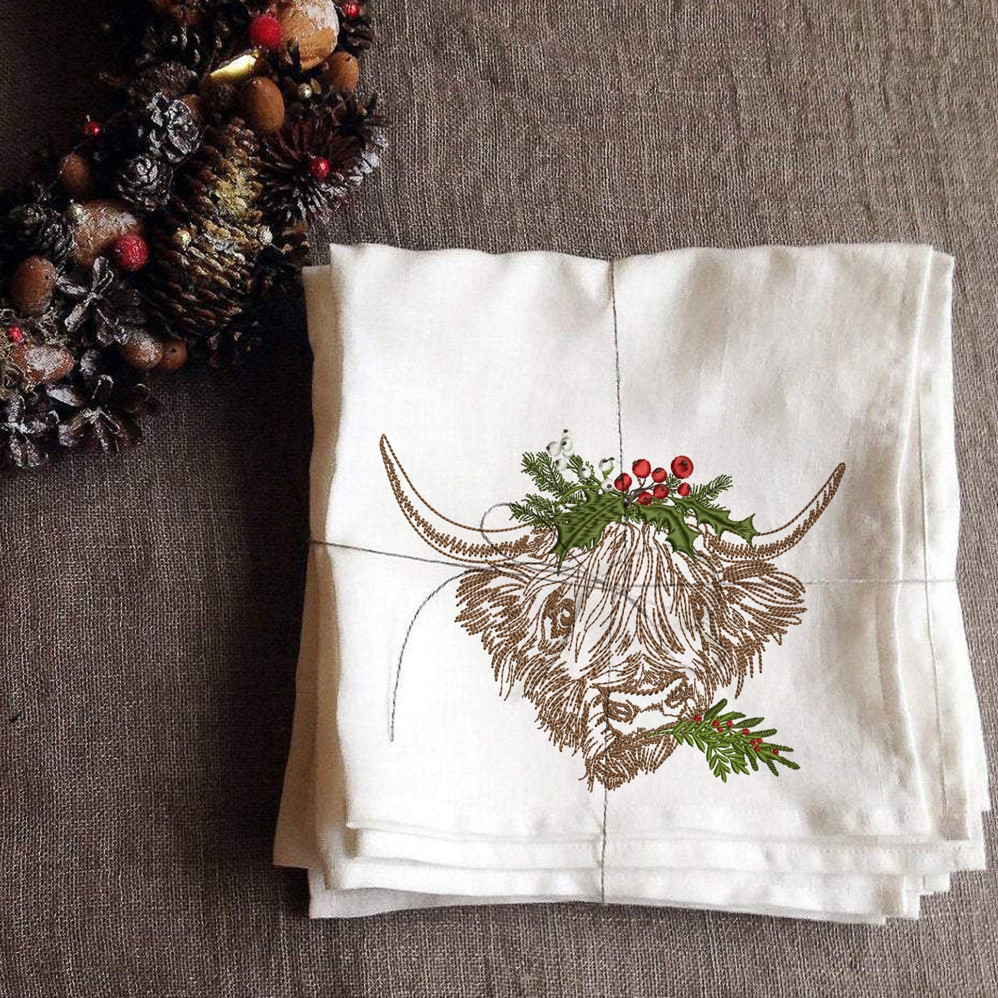 Christmas Highland Cow Machine Embroidery Design on towel