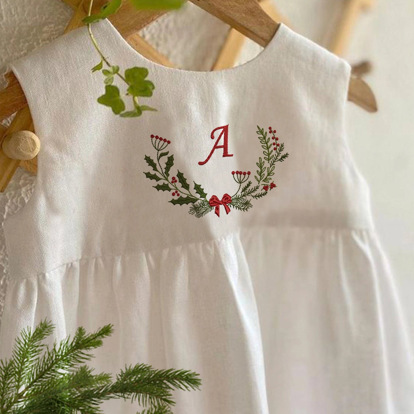 Christmas Monogram Wreath Machine Embroidery Design on baby dress