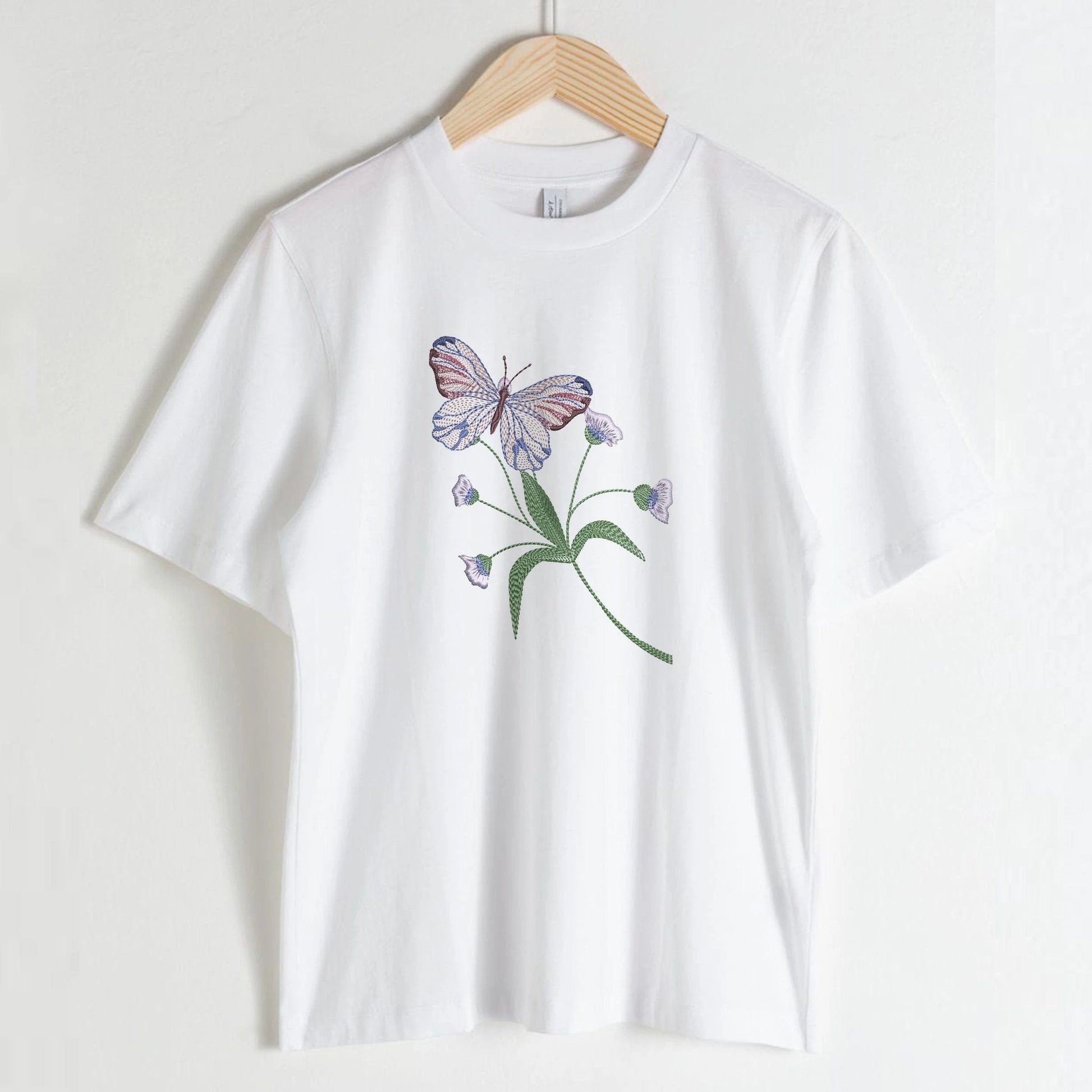 Flower Butterfly Machine Embroidery Design on white t-shirt