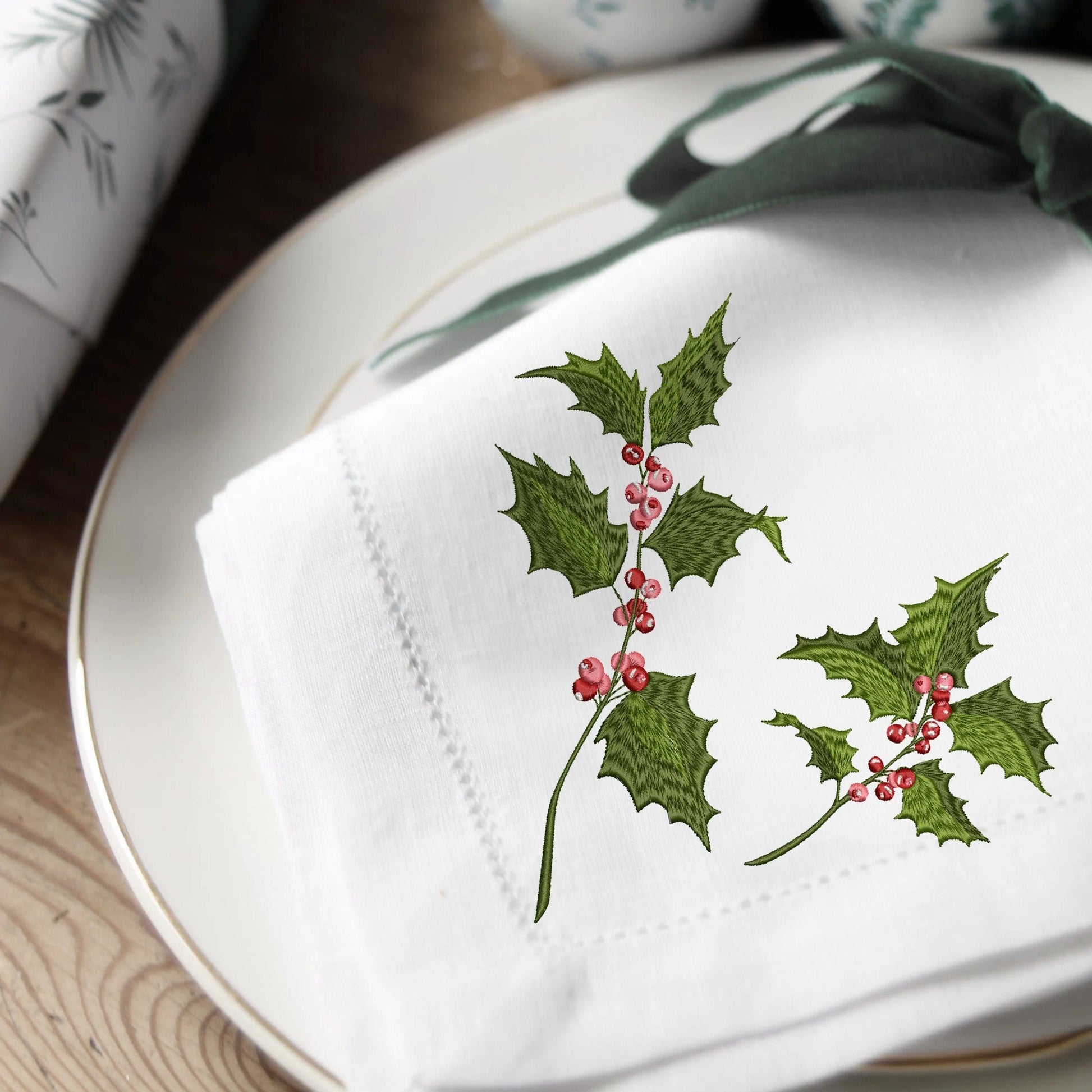 Holly Christmas Machine Embroidery Design on a holiday table napkin