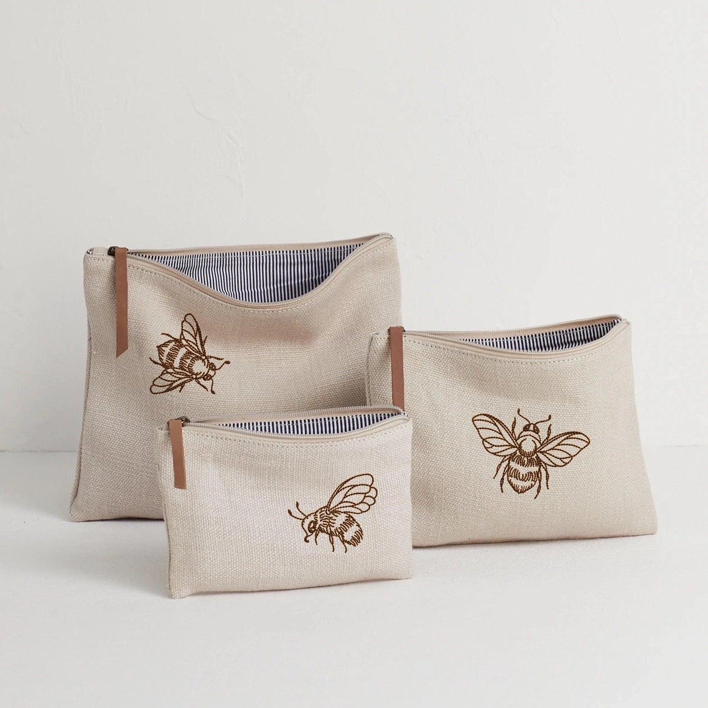 Honey Bee Machine Embroidery Design on a set of pouches